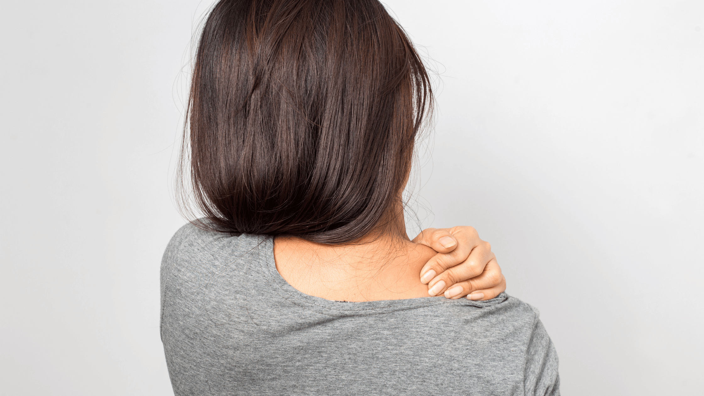 Stress can lead to tight muscles in the shoulders and back.